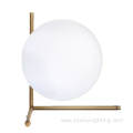 Gold simple metal brackets opal glass table lights